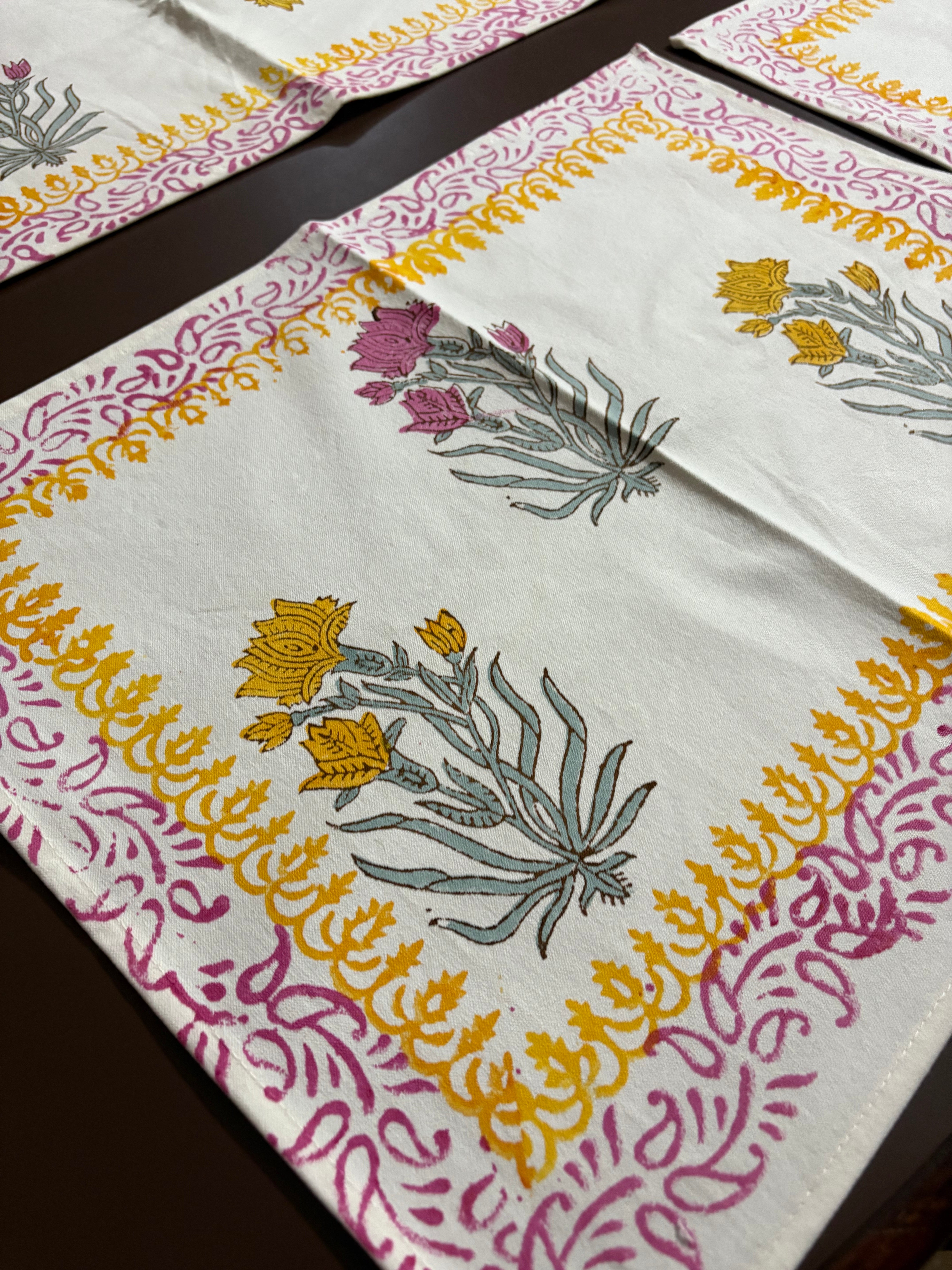 Decorative tablecloth with floral patterns and colorful borders on a wooden surface. Affordable home decor ideas for dinging table. Pinterest homes . Pinterest dining table decor ideas