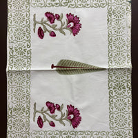Indian beautiful block printed fabric with floral design and decorative border on a white background