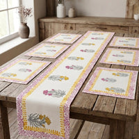 Decorative table runner and placemats on a wooden table with a neutral background. Hand block printed table runner set with table mats 100% original authentic hand block prints rajasthani jaipuri indian. Beautiful table decor ideas for dining.