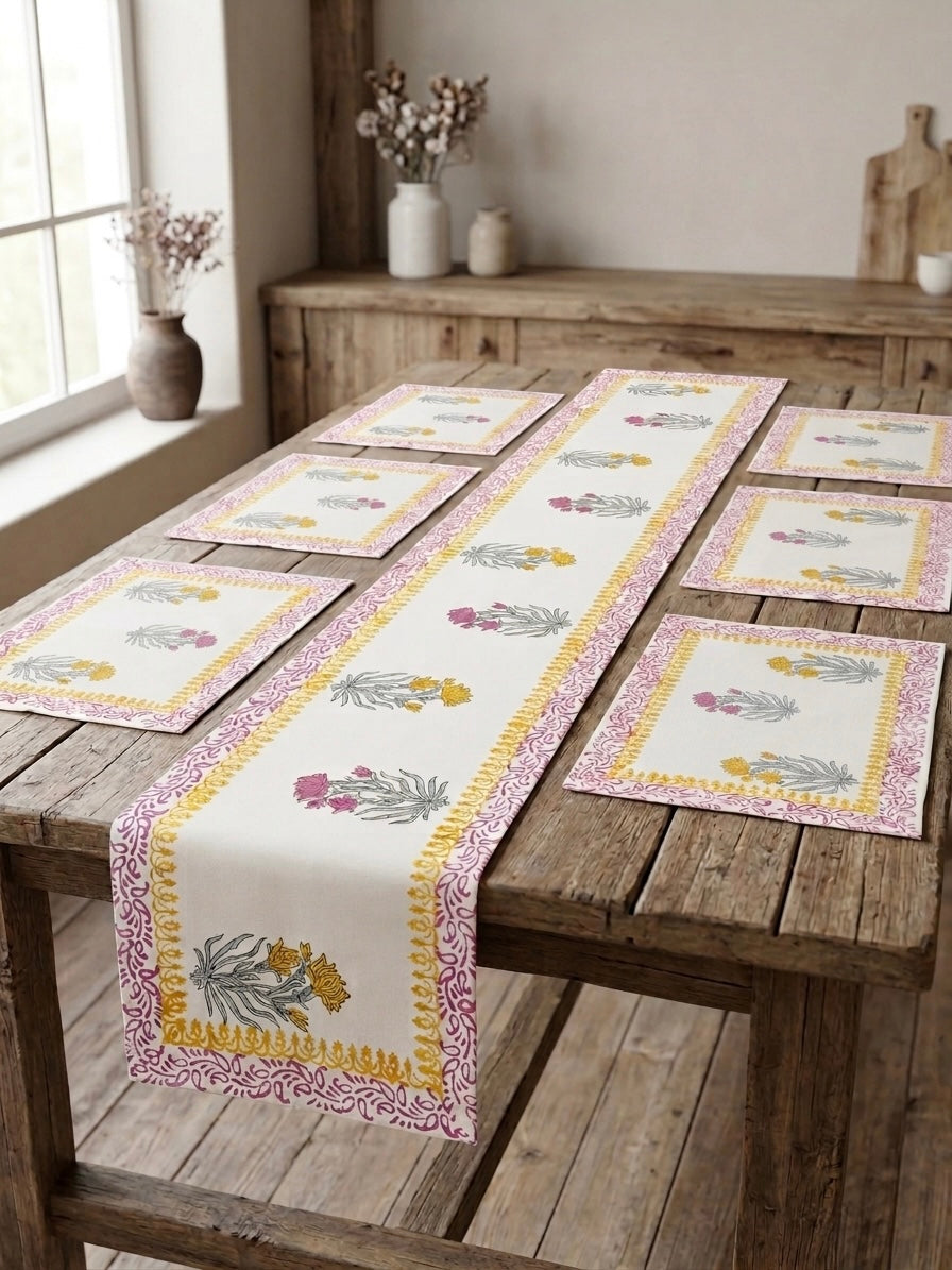 Decorative table runner and placemats on a wooden table with a neutral background. Hand block printed table runner set with table mats 100% original authentic hand block prints rajasthani jaipuri indian. Beautiful table decor ideas for dining.